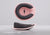 Front and side view of C-shaped eye cups in pink with dark grey interior lining with text "C-shaped eye cups".